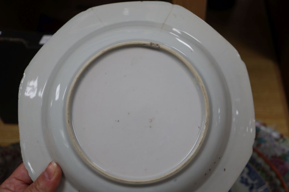 A collection of Oriental chargers and plates,